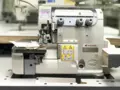 Pegasus MX5204-32R2/223L 1.5 Merrow High- Speed Turn Down Hemming With Table and Servo Motor